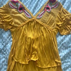 Free people high low yellow top with detailing